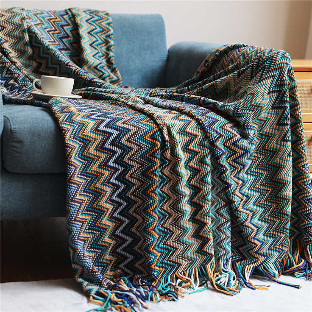 Coperta a maglia con frange a zigzag multicolore