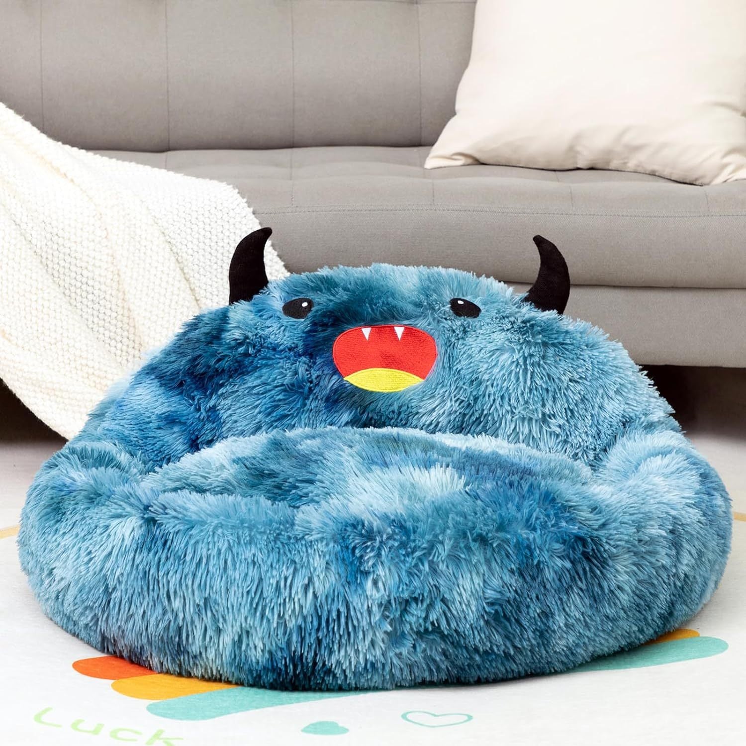 Monster Cozy Cave: Self-Warming Donut Pet Bed