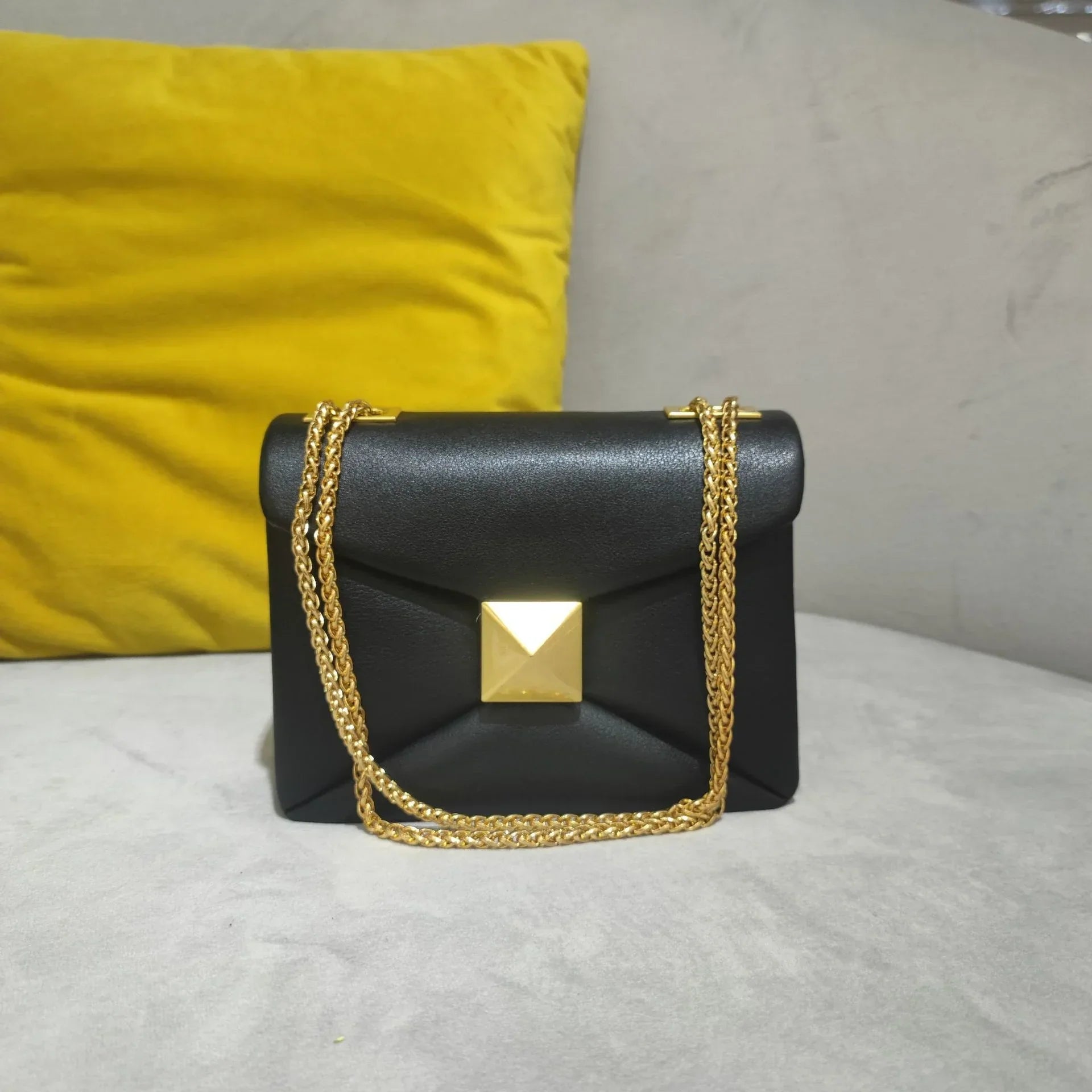 Borsa in pelle iconica da giorno a notte