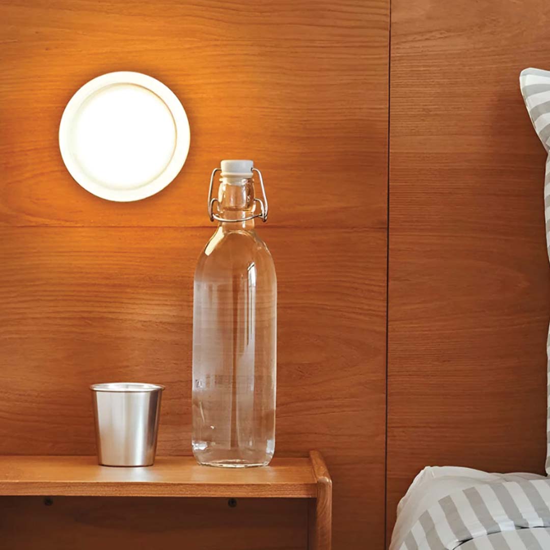 LumièreLux - Elegante lampada da parete Dimple per interni contemporanei