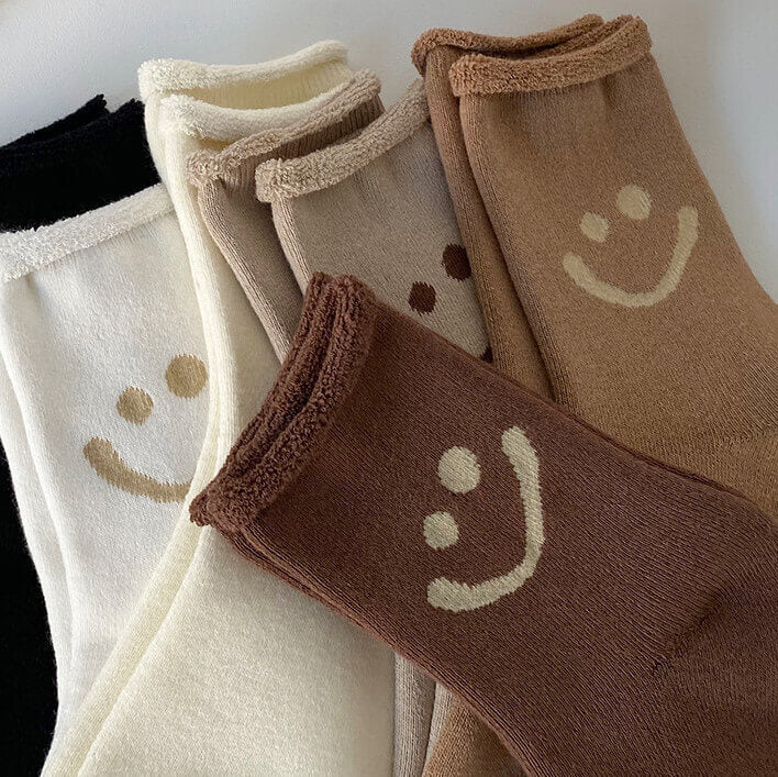 Paquete de calcetines con cara feliz