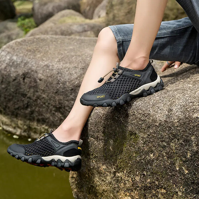 Orthopedic hiking shoes with quick-dry feature