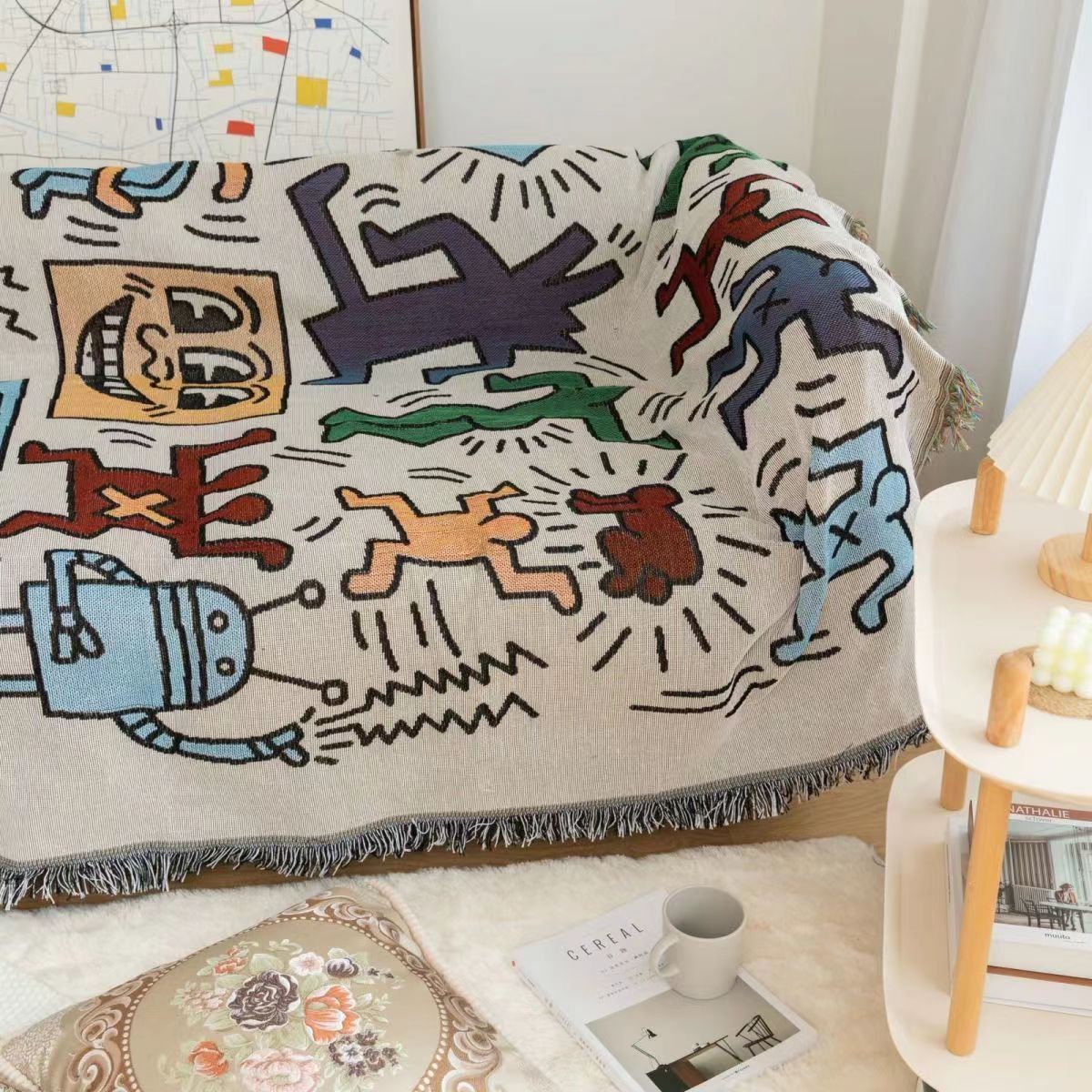 Coperta a forma di puzzle di Keith Haring