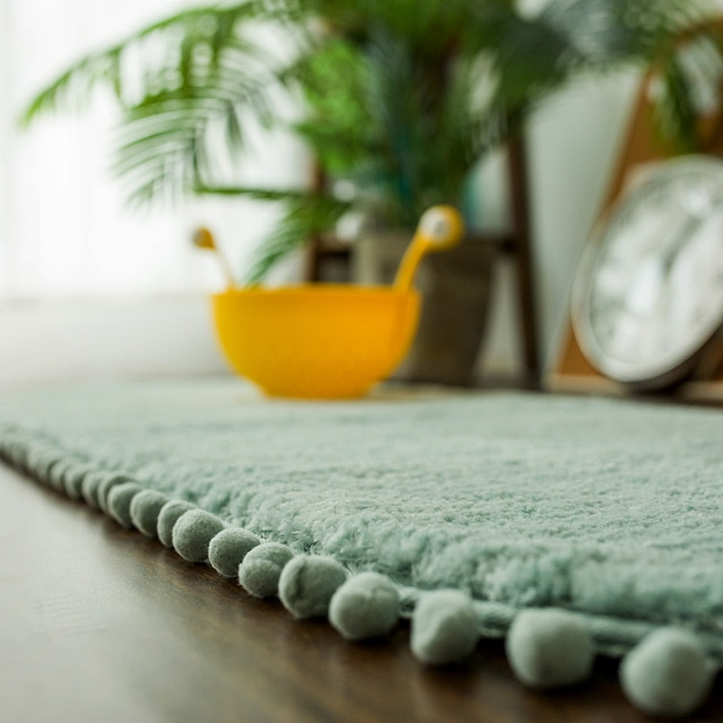 Pom-pom Trimmed Oval Anti-skid Rug