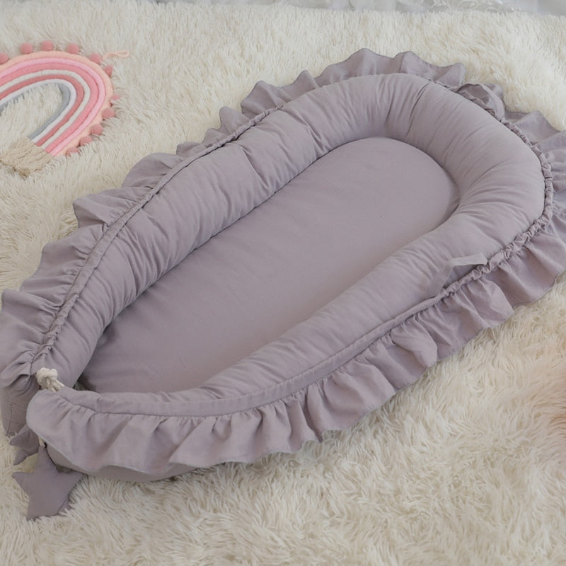 Elegante gewatteerde babynest