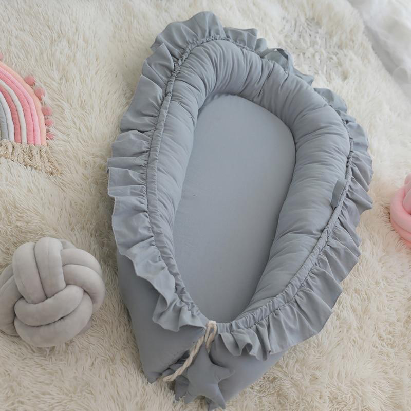 Elegante gewatteerde babynest